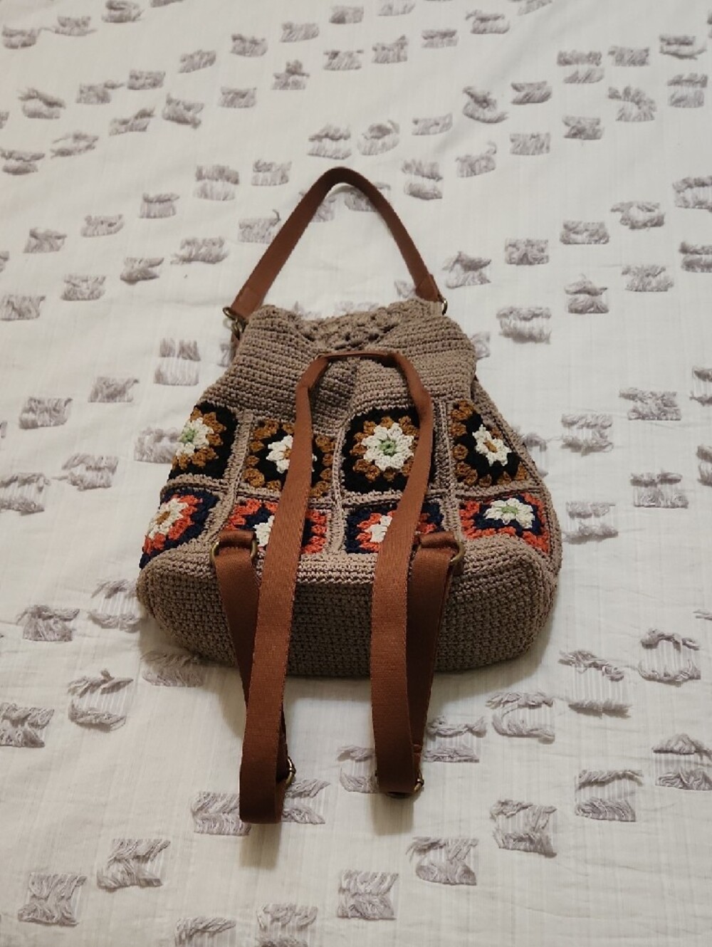The Sak, Sayulita Crochet Flap Backpack Sand Neutral Patch, Medium - Picture 14 of 15